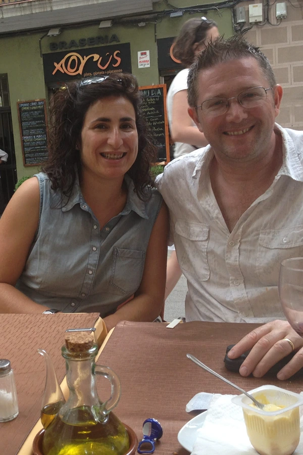 A photo of Ana, a local Catalan, and Dug at a cafe on the Rambla del Poblenou for the barcelonagenius website